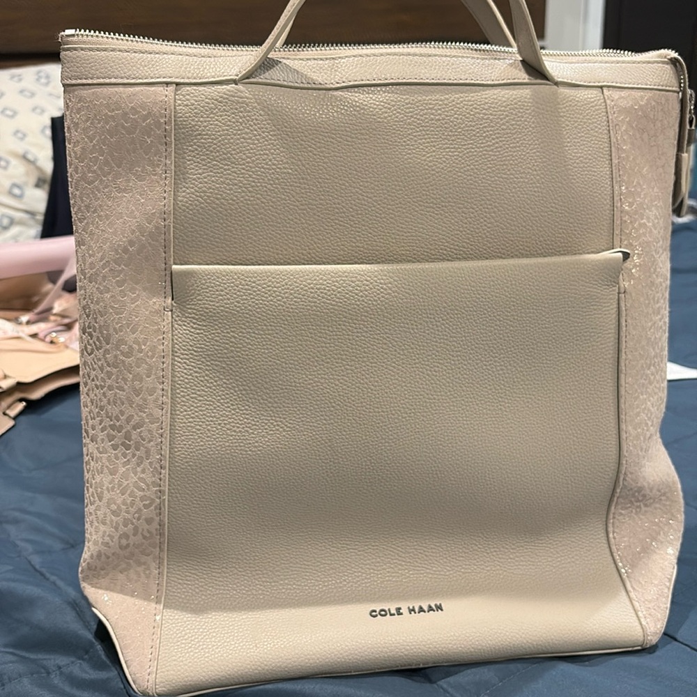 Cole Haan laptop tote bag that fits on suitcase handles. Lightly used.